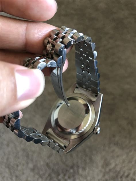 how to open a rolex watch band